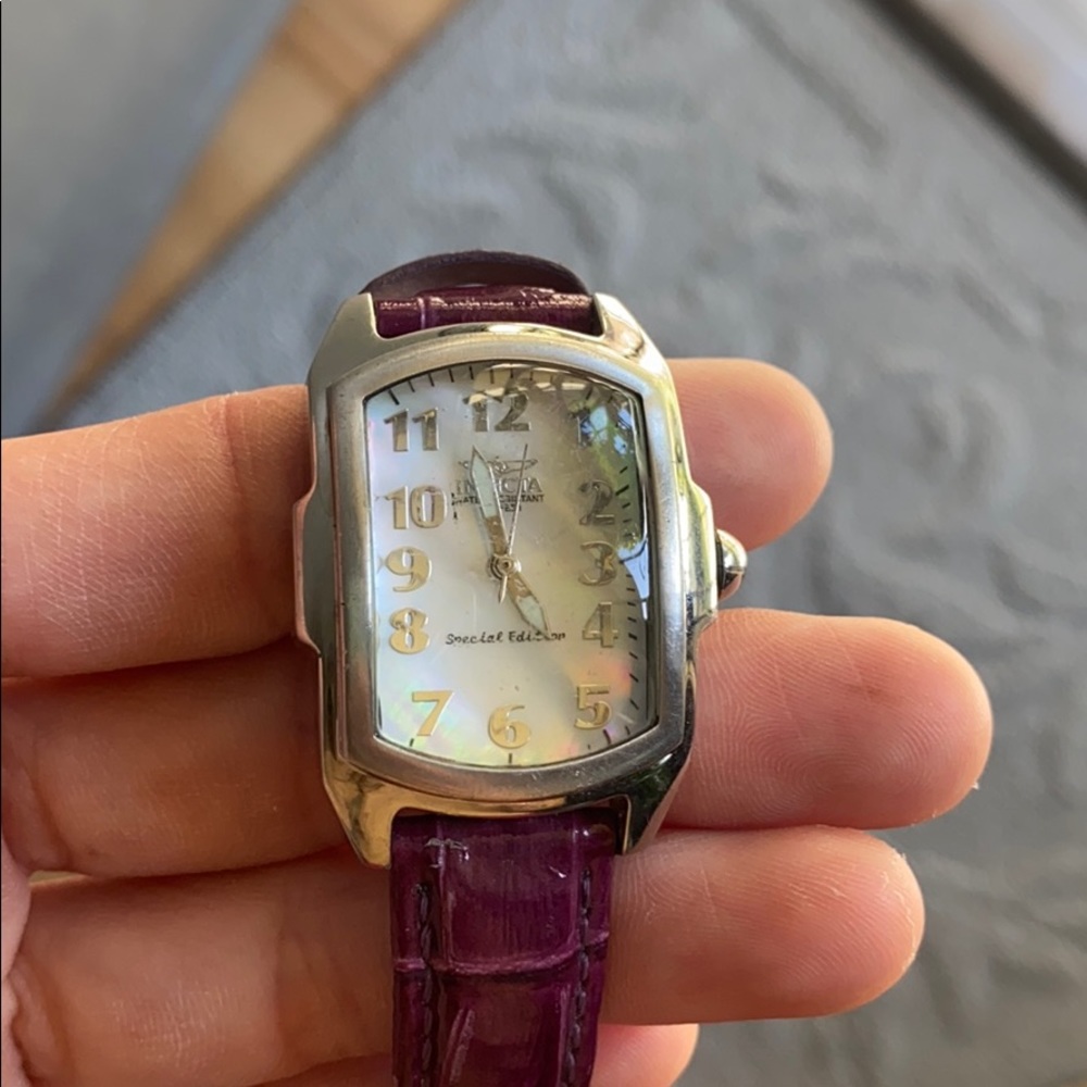 Women’s Invicta watch with leather band